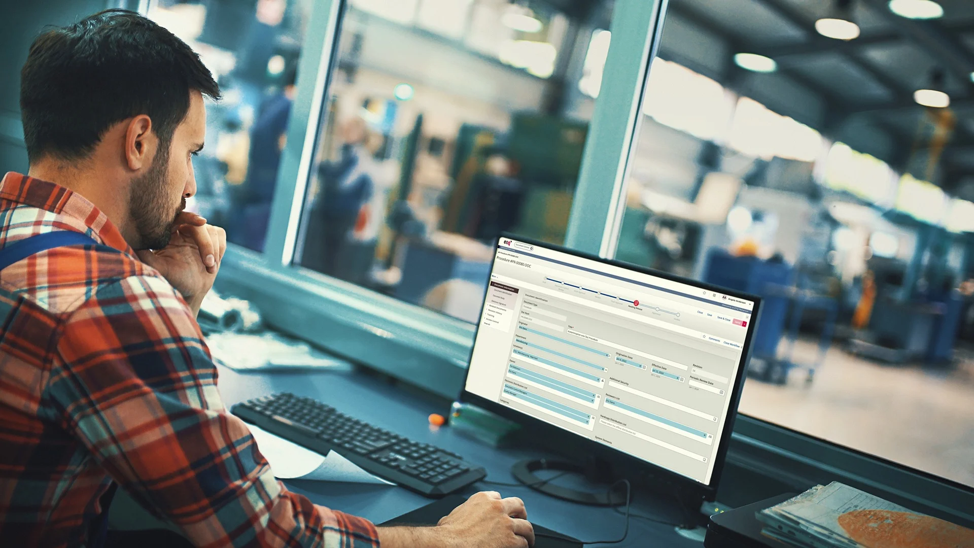 quality professional looking on a computer building his audit plan thanks to ETQ Reliance audit management software